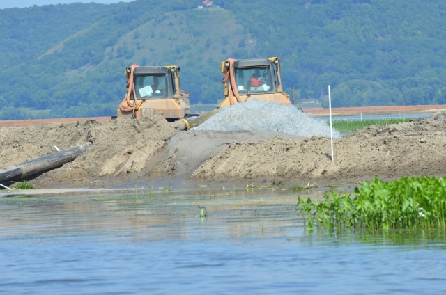 The U.S. Army Corps of Engineers, St. Paul District, completes work on the Capoli Slough Islands restoration project, near Ferryville, Wisconsin, Aug. 23, 2013.