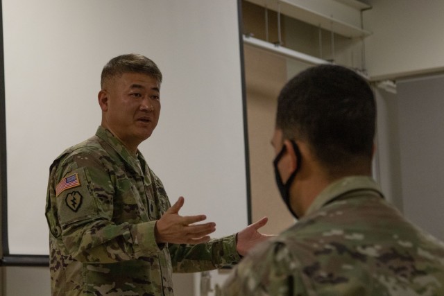 Lt. Col. Martin Cho, command chaplain for the 20th CBRNE Command, leads a religious service during a command post exercise Dec. 5 at Fort Indiantown Gap, Pennsylvania. The exercise was one step along the path to Global Defender 22, a U.S. Army Europe-Africa focused exercise in in April 2022, during which the command will test its theater CBRNE command concept. 