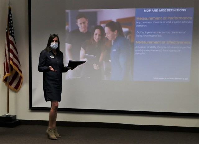 A student in Fort Knox’s fall Garrison Leadership Academy addresses leadership, instructors and classmates during group final presentations Dec. 9, 2021.