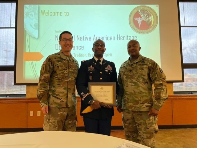 Lt. Col. Bashiri Phillips, center, is pictured with Col. Victor Suarez, left, commander of the 6th Medical Logistics Management Center, and Sgt. Maj. Stanley Jackson. Phillips served as the guest speaker of a Native American Heritage observance, hosted by the 6th MLMC on Nov. 29 at Fort Detrick, Maryland.