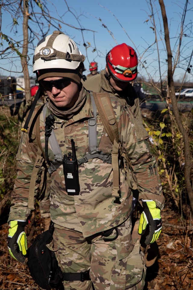 Army Guardsmen with the 301st Chemical Battalion and Air Guardsmen with the 123rd Airlift Wing continue search and rescue missions in Mayfield, Ky. on December 12th, 2021.
...