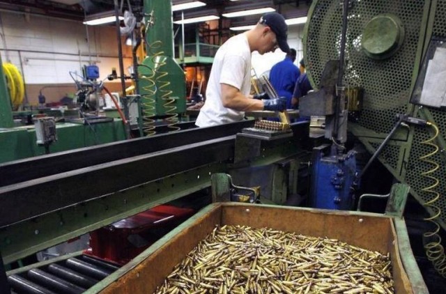 A worker at Lake City Army Ammunition Plant, a government-owned, contractor-operated installation under the Army Materiel Command’s Joint Munitions Command, assembles small-caliber rounds. LCAAP is one of several JMC facilities where contracts are being reformed to provide munitions readiness to warfighters at a lower cost.