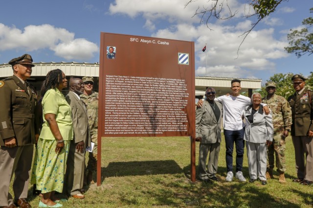 The 3rd Infantry Division dedicates the Sgt. 1st Class Alwyn C. Cashe Garden, to honor the Silver Star Medal recipient for his acts of gallantry and intrepidity above and beyond the call of duty, Fort Stewart, Georgia, May 20, 2021. Members of the Cashe family joined the 3rd ID command team for the ceremony and unveiling of the Cashe Garden sign. (U.S. Army Photo by Spc. Savannah Roy)