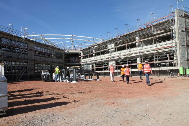 U.S. Army Corps of Engineers personnel tour the construction site of the Kaiserslautern High School September 28, 2016. The school was one of the earliest of 14 schools that have been built in a $1.6 billion construction program the U.S. Army...