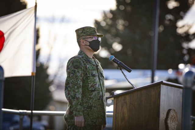 Japan Ground Self Defense Force soldier Col. Koichi Koba, commander of 32nd Infantry Regiment, delivers a speech to both Japanese and American Soldiers during the opening ceremony to Rising Thunder 2021 on Yakima Training Center, Dec. 1, 2021. Rising Thunder is an annual combined arms exercise between the U.S. Army and the Japan Ground Self-Defense Force designed to validate combat readiness and develop interoperability between our militaries. (U.S. Army photo by Spc. Dean Johnson)