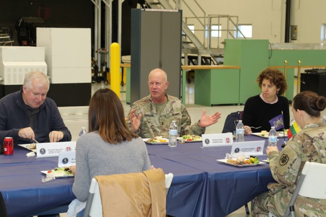 Lithuanian dignitaries and Pennsylvania National Guard leaders eat lunch together during a visit to Fort Indiantown Gap. The visit was in support of the State Partnership Program and recognized the 28 year partnership between Lithuania and...