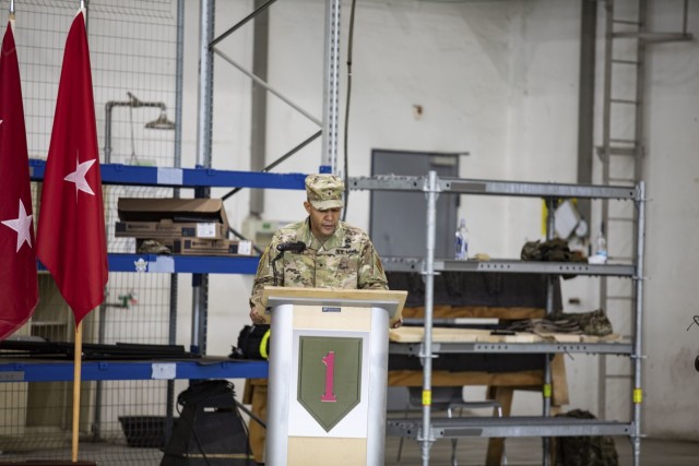 Big. Gen. Andrew Gainey, deputy commander of 1st Infantry Division, gives remarks during a transfer of responsibility ceremony between 1st Combat Aviation Brigade and 1st Air Cavalry Brigade at Illesheim Army Air Base, Germany, Dec. 15, 2021....