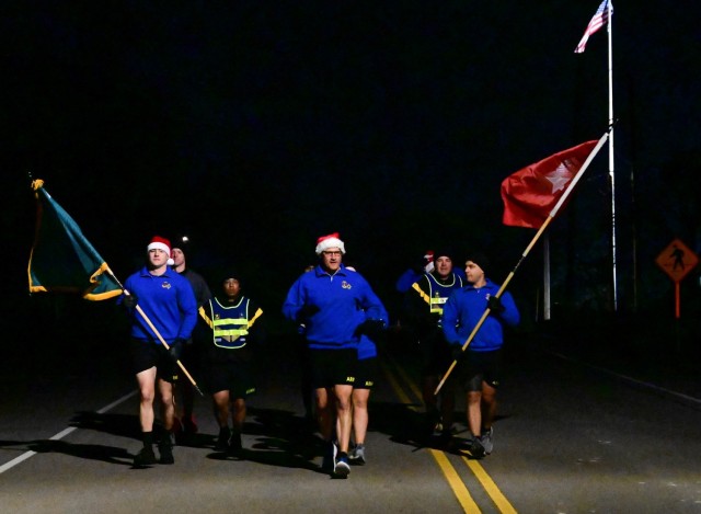 ‘Let’s go for a little run,’ said Brig. Patrick R. Michaelis, Fort Jackson commanding general, after morning reveille Dec. 14, 2021. Units and trainees across the installation joined Michaelis for the Fort Jackson Holiday Run to build unit...