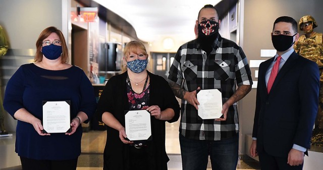 Matt Sannito, deputy to the commanding general, U.S. Army Sustainment Command, stands with ASC security personnel who have achieved their Security Professional Education Development certification Dec. 2 at ASC headquarters, Rock Island Arsenal,...