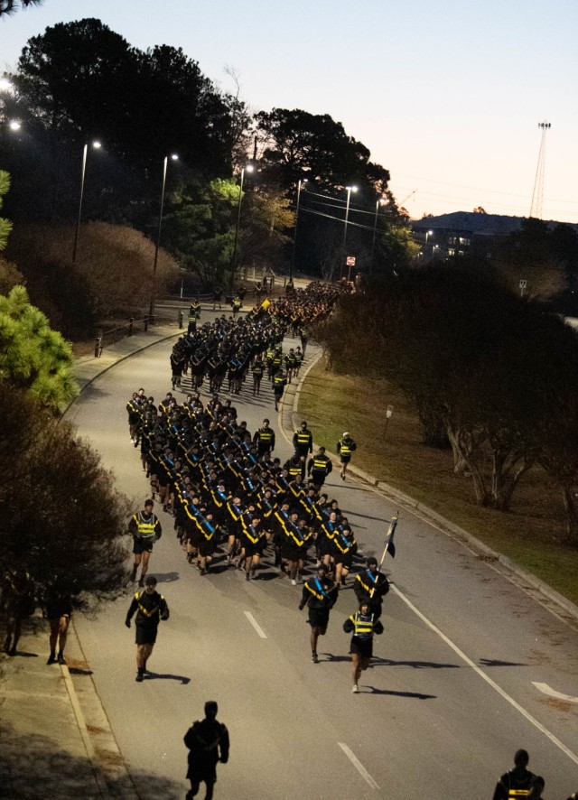 Soldiers wind their way down Marion Avenue Dec. 14, 2021, during the Fort Jackson, SC, Holiday Run. Holiday songs blared from loudspeakers to celebrate the holiday season and the holiday season.