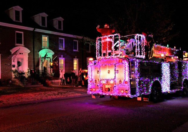 Fort Knox housing residents wave to Santa as he tours installation neighborhoods Dec. 15, 2021.