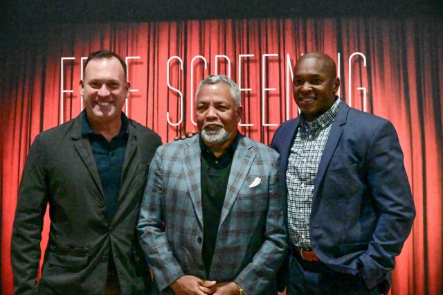 Fort Jackson Deputy Commanding Officer Col. Michael Larsen, left, Mike ‘Ranger’ Jones, veteran and military liaison for the movie industry, center, and Post Command Sgt. Maj. Philson Tavernier, right, pose for a photo at the premiere screening...