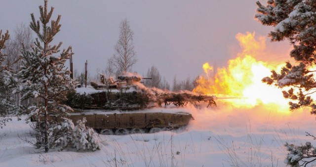 U.S. Army Soldiers with 3rd Battalion, 66th Armored Regiment, 1st Armored Brigade Combat Team, 1st Infantry Division, fire an M1 Abrams tank as part of a multi-company live-fire exercise at Camp Ādaži, Ādaži, Latvia, Dec 3, 2021. Soldiers with 3-66 are currently participating in Winter Shield 2021. The relationships with U.S. NATO allies and partners have been forged over the past seven decades and are built on a foundation of shared values, experiences and trust. 