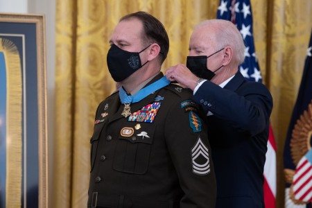 President Joseph R. Biden Jr. presents the Medal of Honor to U.S. Army Master Sgt. Earl D. Plumlee during a ceremony at the White House in Washington, D.C., Dec. 16, 2021. Master Sgt. Plumlee was awarded the Medal of Honor for actions of valor during Operation Enduring Freedom while serving as a weapon’s sergeant with Charlie Company, 4th Battalion, 1st Special Forces Group (Airborne), near Ghazni, Afghanistan, Aug. 28, 2013. 