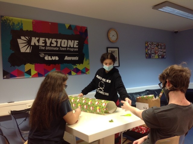 Members of BMC’s Keystone Club wrapped donated gifts as part of the Angel Tree program Dec. 13. Photo courtesy of BMC Youth Programs