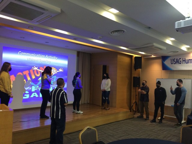 Couples from U.S. Army Garrison Humphreys split into teams for a communication competition at a Strong Bonds marriage training event Dec. 10, 2021 at Vivaldi Ski Resort in Hongcheon City, South Korea.