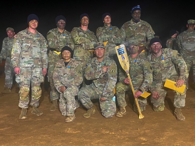 the winners of the best quad competitions, 27th Engineer Battalion from the 20th Engineer Brigade pose with their award on Dec. 15, 2021, on Fort Bragg North Carolina. The competition was done to aid in unit cohesion and readiness.