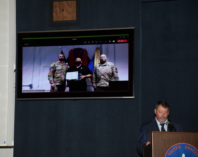 The U.S. Army Aviation Center of Excellence Civilian Academic Instructor of the Year, (who is also the 4th Quarter winner), for Fiscal Year 2021, Alexander A. Tejada, 128th Aviation Brigade, Joint Base Langley-Eustis, Virginia, is honored virtually during a ceremony at the U.S. Army Aviation Museum at Fort Rucker, Alabama, Dec. 16, 2021. (U.S. Army photo by Kelly Morris)