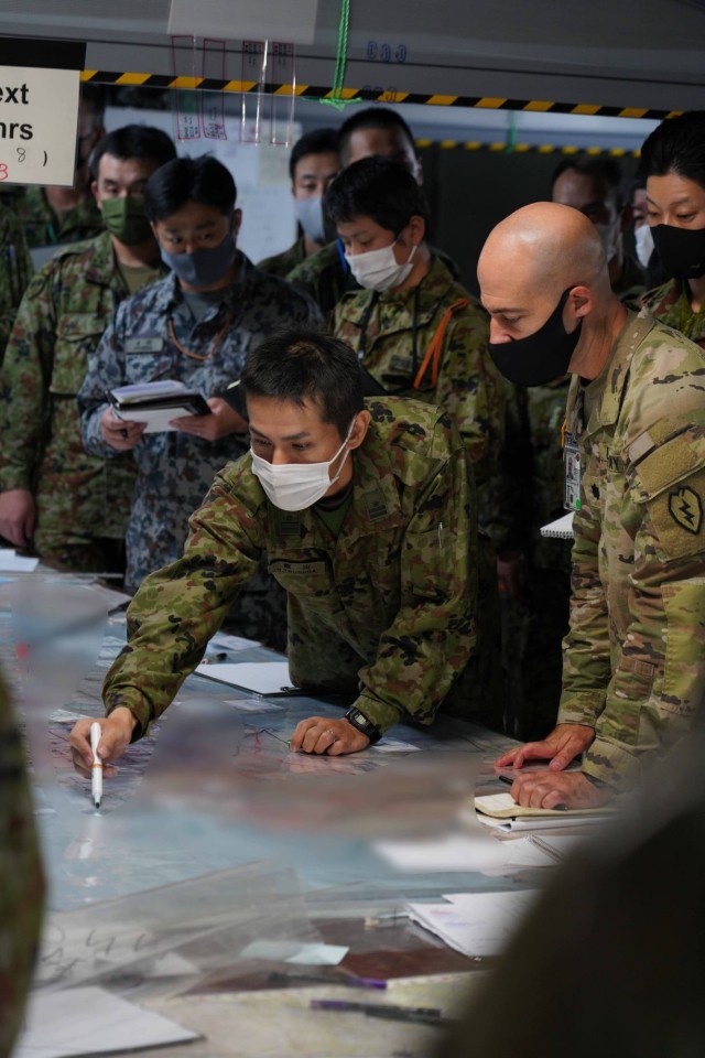 U.S. Army Soldiers with the 25th Infantry Division and Japan Ground Self-Defense Force Middle Army members participate in a bilateral targeting working group at Camp Itami, Dec. 6, as part of Yama Sakura 81. Yama Sakura tests and refines multi-domain and cross-domain concepts in a simulated scenario that depicts defending Japan against any threat. Yama Sakura 81 is the largest U.S.-Japan bilateral and joint command post exercise, which enables participants to work as dedicated partners in support of the U.S.-Japan security alliance and for continued peace and stability in the Indo-Pacific. 