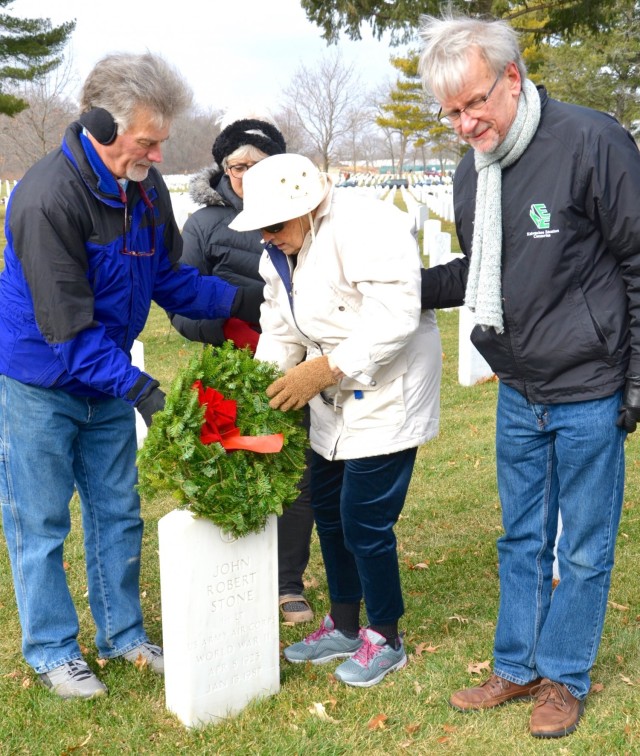 Marilynn Palmquist Stone, age 97, places a wreath on the grave of her husband, John Robert Stone, at Rock Island National Cemetery in Illinois at the annual Wreaths Across America event held Dec. 18. A lifelong resident of Rock Island, Illinois,...