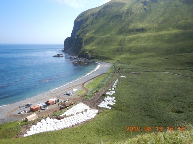 Stacked bags of contaminated soil wait to be transported from the Cape Prominence Formerly Used Defense Site during cleanup efforts by the U.S. Army Corps of Engineers – Alaska District. Located on a remote part of Unalaska in the Aleutian...