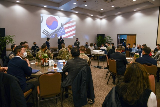 Col. Seth Graves, U.S. Army Garrison Humphreys commander, gives opening remarks during the K6 Korea-America Friendship Association ROK-U.S. Friendship Night and year-end dinner at the Camp Humphreys Flightline Tap Room Dec. 15, 2021.