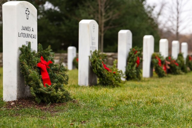 Wreaths adorn headstones of the veterans buried at Fort Devens cemetery.