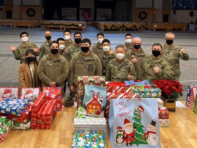 Soldiers from the U.S. Army Garrison Humphreys Religious Support Office prepare to deliver gifts to military and South Korean children as part of Operation Happy Holidays Dec. 20, 2021. (Photo courtesy of Chaplain (Maj.) Christian Bang)