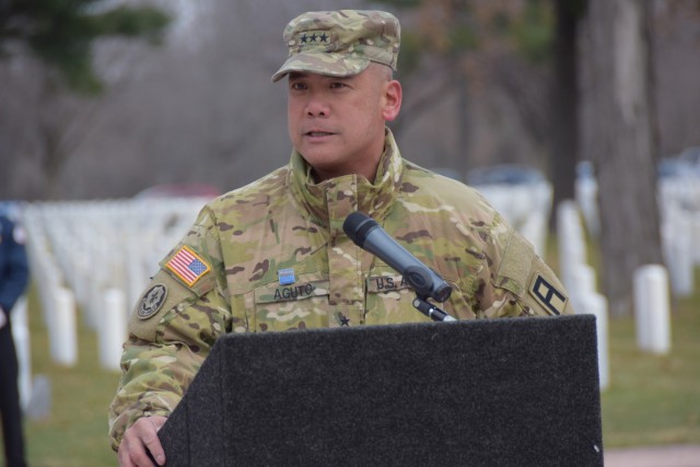 Lt. Gen. Antonio A. Aguto Jr., commanding general, First Army, addresses those in attendance as the keynote speaker at the Wreaths Across America event head at the Rock Island National Cemetery on Dec. 18.
