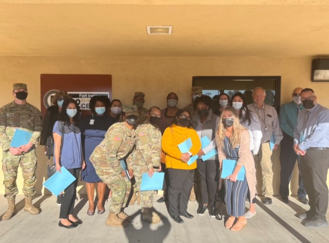 Staff members with Weed Army Community Hospital’s Behavioral Health Department meet with staff from Fort Irwin’s Ready and Resilient (R2) Performance Center December 2, 2021 on Fort Irwin, Calif. (Courtesy Photo/ Weed ACH)