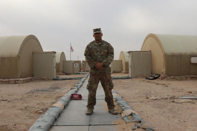 Sgt. Aqeel Ahmed poses for a photo at Camp Buehring, Kuwait.

