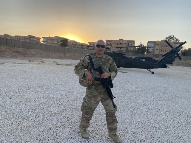 Sgt. Aqeel Ahmed poses for a photo while deployed to the Middle East with the 40th Combat Aviation Brigade.