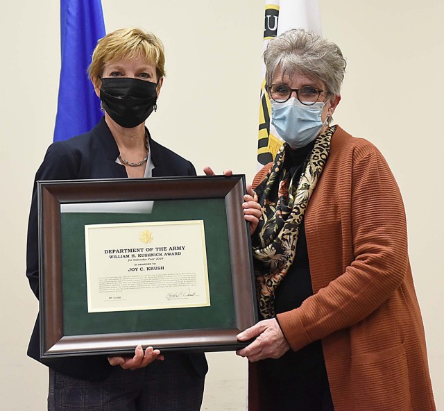 Carol Burton (left), Senior Executive Service, director, Civilian Human Resources Agency, U.S. Army, Aberdeen Proving Grounds, Maryland, presents the 2020 William H. Kushnick award to Joy Krush, a supervisory human resources specialist, CHRA,...