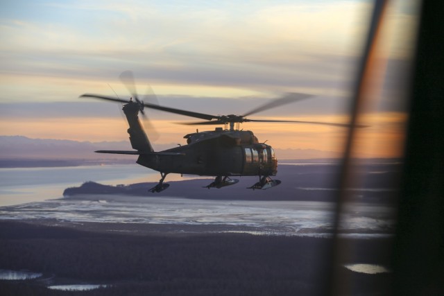 File photo of Alaska Army National Guardsmen from 1st Battalion, 207th Aviation Regiment, conducting an aerial site survey via a UH-60 Black Hawk helicopter Dec. 3, 2018. (U.S. Army National Guard photo by Balinda O’Neal Dresel) 