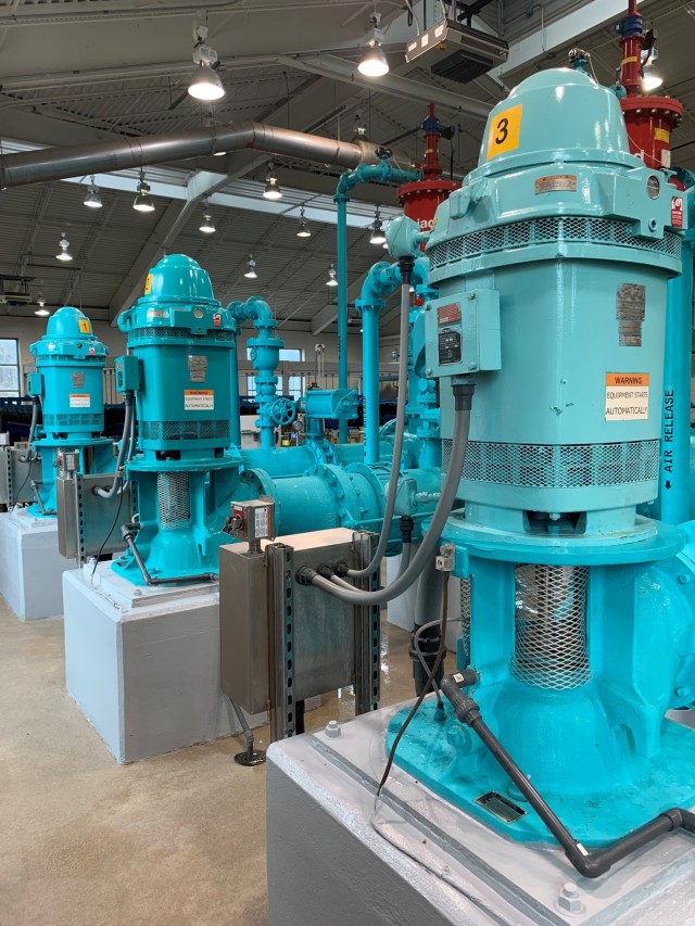 Large water pumps feed membrane filtration assemblies that remove .03 micron sized impurities from water at Fort Benning Water Resource Facility, Dec. 30, 2021.