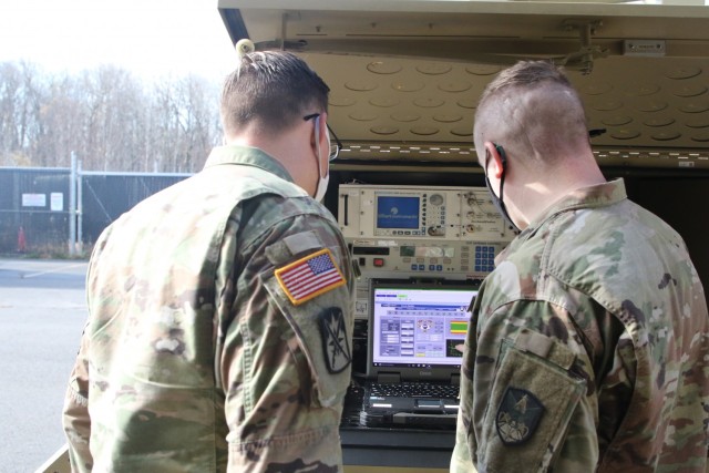 Soldiers from the High Tech-Regional Training Site Tobyhanna 25Q reclassification course in Tobyhanna, Pa, receive hands on training with a Satellite Transportable Terminals on Nov. 20, 2021. They use the STT to set up secure networks Troops can use like a hotspot in field environments.