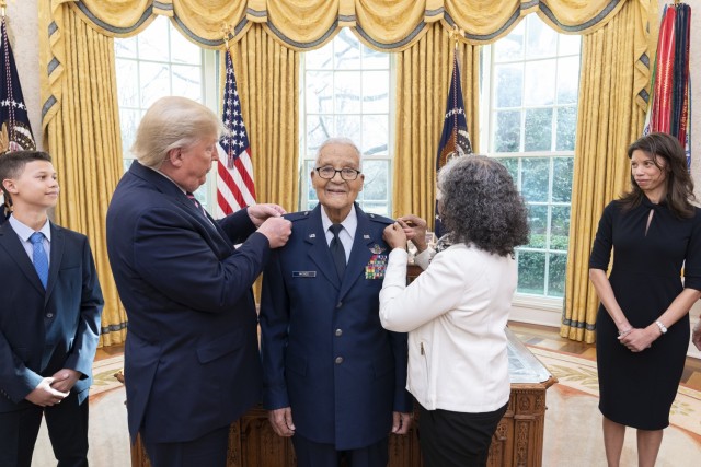 President Donald J. Trump participates in the promotion pinning ceremony of Brig. Gen. (ret.) Charles McGee, a World War II veteran and member of the Tuskegee Airmen, Feb. 4, 2020, at the White House.