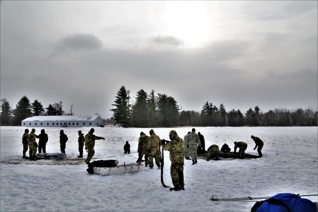 Soldiers learn to build Arctic tents during CWOC training at Fort McCoy
