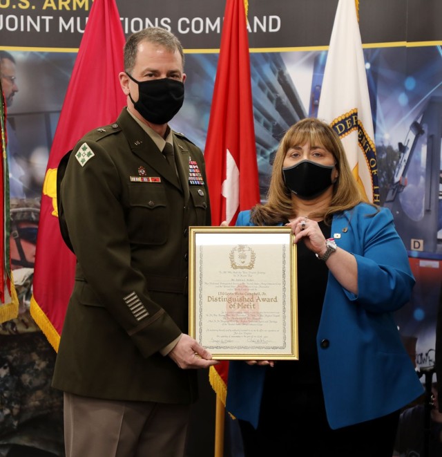 Fisher was presented with her official retirement certificate and numerous awards for her efforts during her career with the Army. 