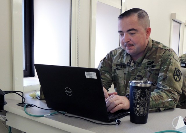Chief Warrant Officer 3 Joseph Sheets applies his new-found knowledge to complete an assignment during Contracting Officer Representative Exercise 22.1 at Army Sustainment Command-Army Reserve Element headquarters on Rock Island Arsenal, Ill.                                                                                                         