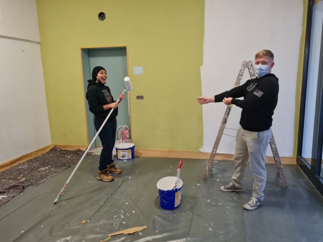 U.S. Marine volunteers rolled up their sleeves and volunteered their time to help paint a school building down the street from U.S. Marine Forces Europe and Africa headquarters at Panzer Kaserne in Böblingen, Germany.