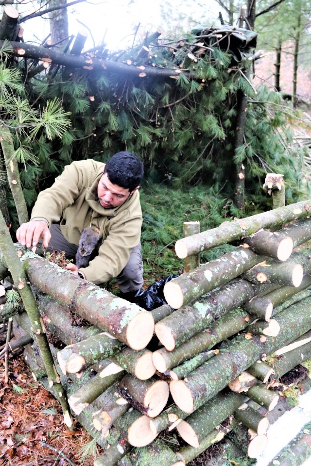 Building improvised shelters for Fort McCoy&#39;s Cold-Weather Operations Course