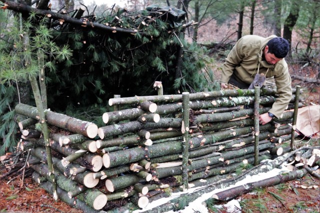 Building improvised shelters for Fort McCoy&#39;s Cold-Weather Operations Course