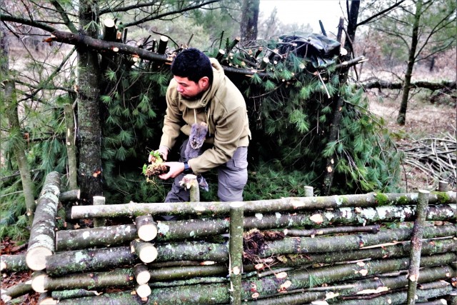 Building improvised shelters for Fort McCoy&#39;s Cold-Weather Operations Course
