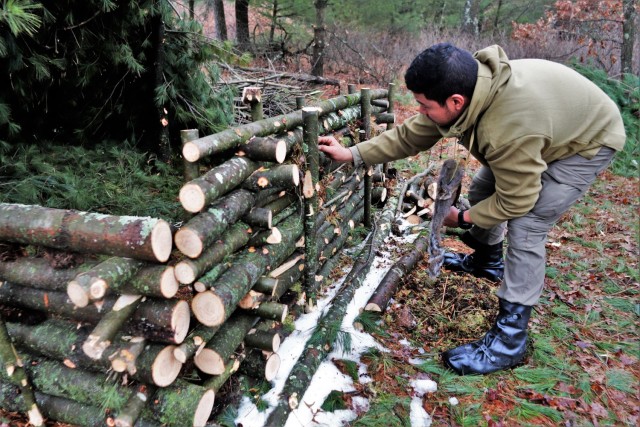 Building improvised shelters for Fort McCoy&#39;s Cold-Weather Operations Course