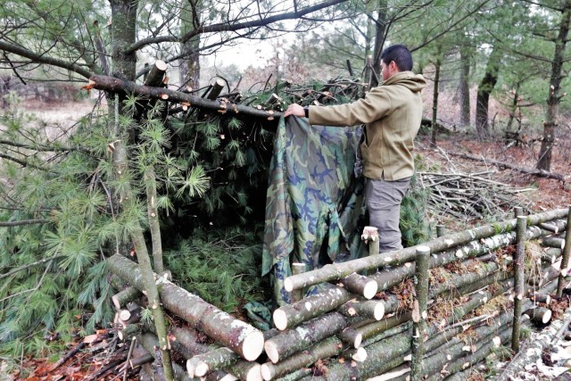 Building improvised shelters for Fort McCoy&#39;s Cold-Weather Operations Course