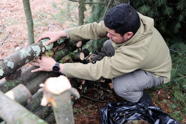 Building improvised shelters for Fort McCoy&#39;s Cold-Weather Operations Course