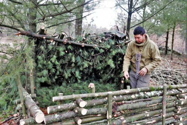 Building improvised shelters for Fort McCoy&#39;s Cold-Weather Operations Course