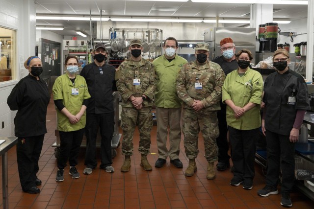 Fourth from left, Sgt. Blake Sullivan of Charlie Company, 3rd of the 172nd Infantry (Mountain) Regiment, and, fourth from right, Staff Sgt. Tom Blythe of Joint Force Headquarters, with the Monadnock Community Hospital’s nutrition and food...