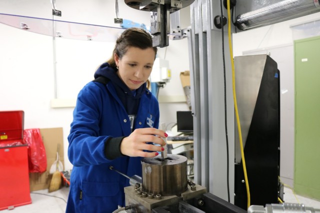 Johns Hopkins University graduate student processing a magnesium alloy sample.  